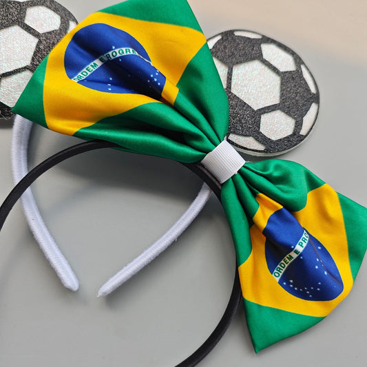 Nxtpz close-up of bow knot detail highlighting printed satin texture and vibrant colors