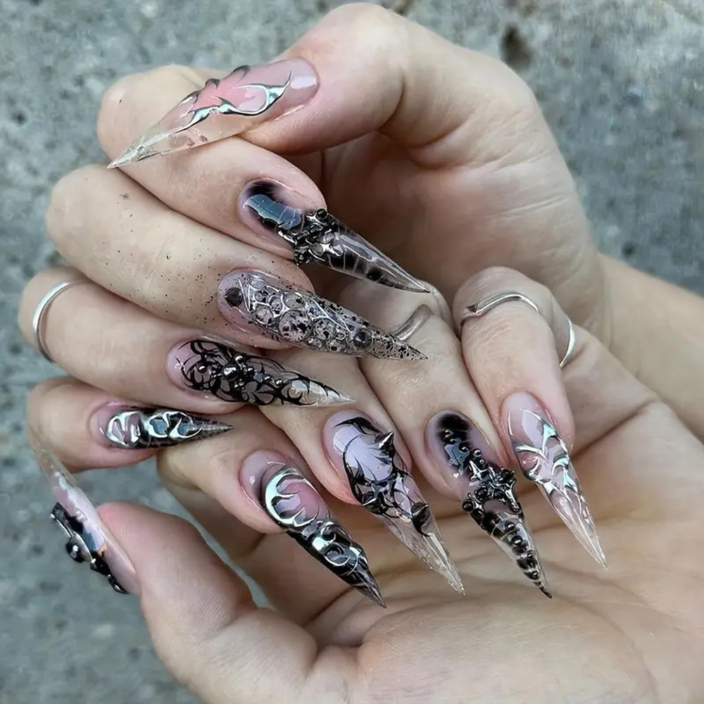 Nxtpz front packaging showing 24 glossy black stiletto nails and accessories for instant glam