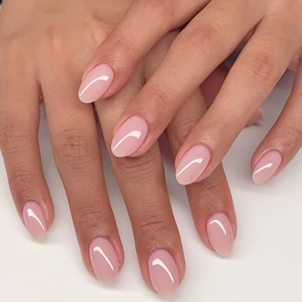 Nxtpz front packaging showing glossy light pink nails and included accessories for quick application