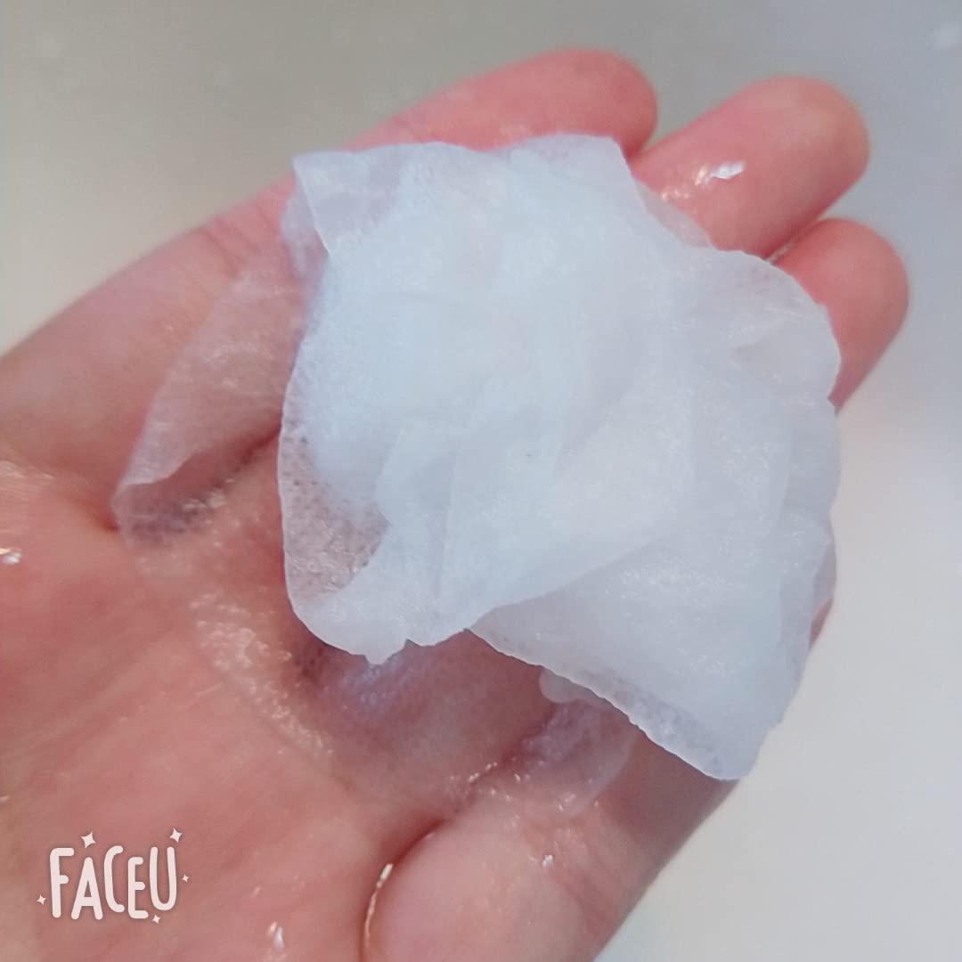 NYKKOLA expanded mask on hand demonstrating full-size coverage and softness