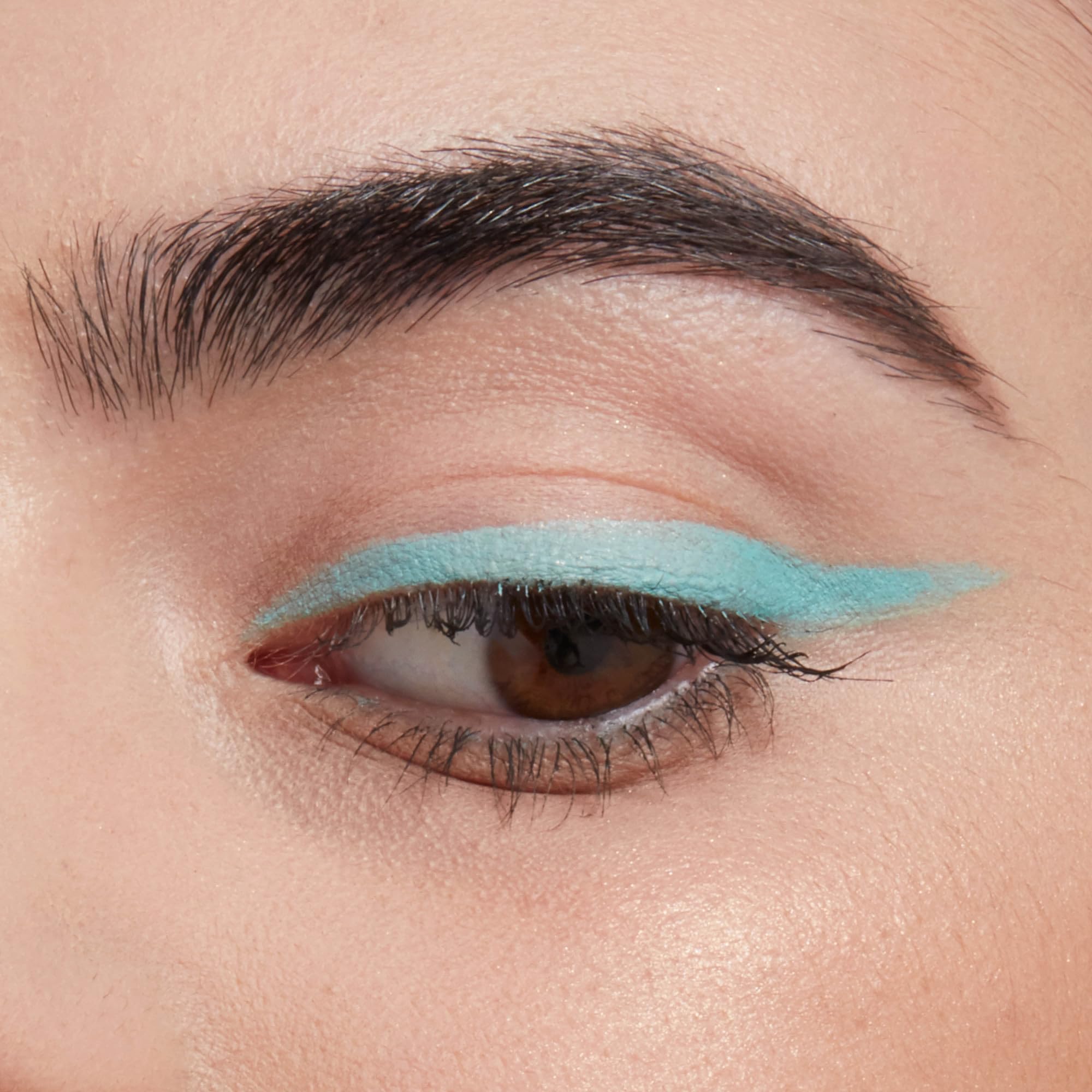 NYX PROFESSIONAL MAKEUP pencil being sharpened to a fine point for crisp eyeliner control