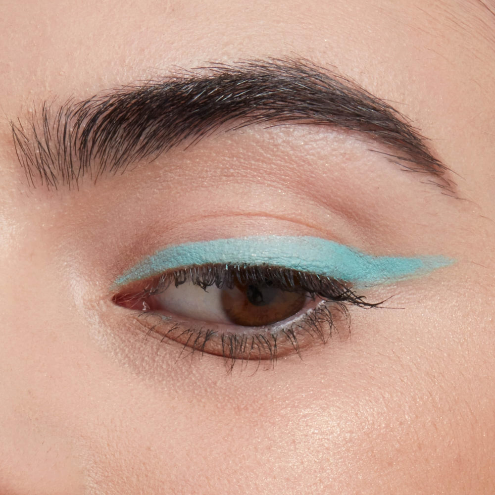 NYX PROFESSIONAL MAKEUP pencil being sharpened to a fine point for crisp eyeliner control