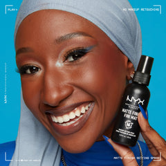 NYX PROFESSIONAL MAKEUP bottle beside makeup kit showing compatibility with foundations and powders