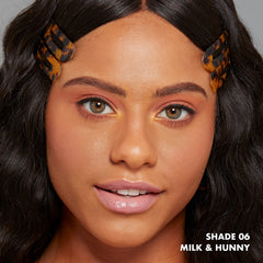 NYX PROFESSIONAL MAKEUP lip swatch close-up highlighting sheer honey tint and shine