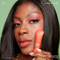 NYX PROFESSIONAL MAKEUP next to coin showing compact size and travel convenience