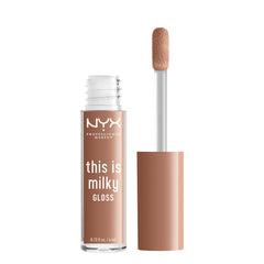 NYX gloss beside a coin to show compact size and easy portability benefit
