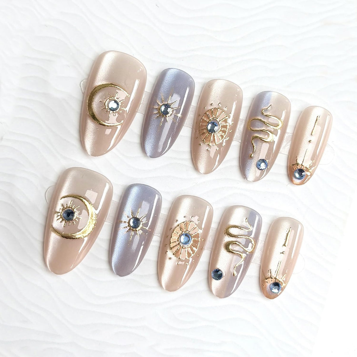 NZRAESTRS front packaging showing gold star press-on nails for instant glam