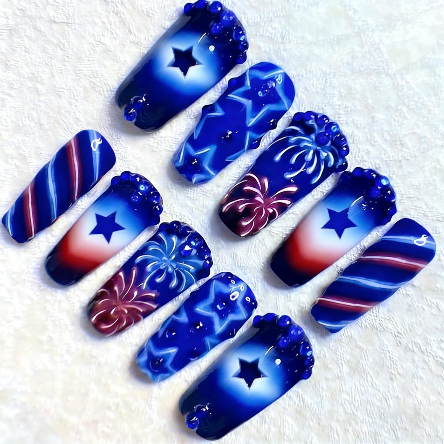 NZRAESTRS front packaging showing full 24-piece patriotic nail set for convenience