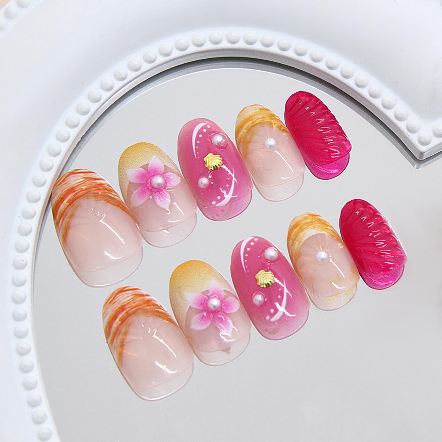 NZRAESTRS full set of 24 pink short almond nails arranged to show design variety and coverage