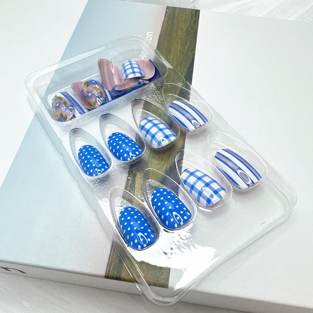 NZRAESTRS short almond nails in hand showing scale and natural-looking fit benefit