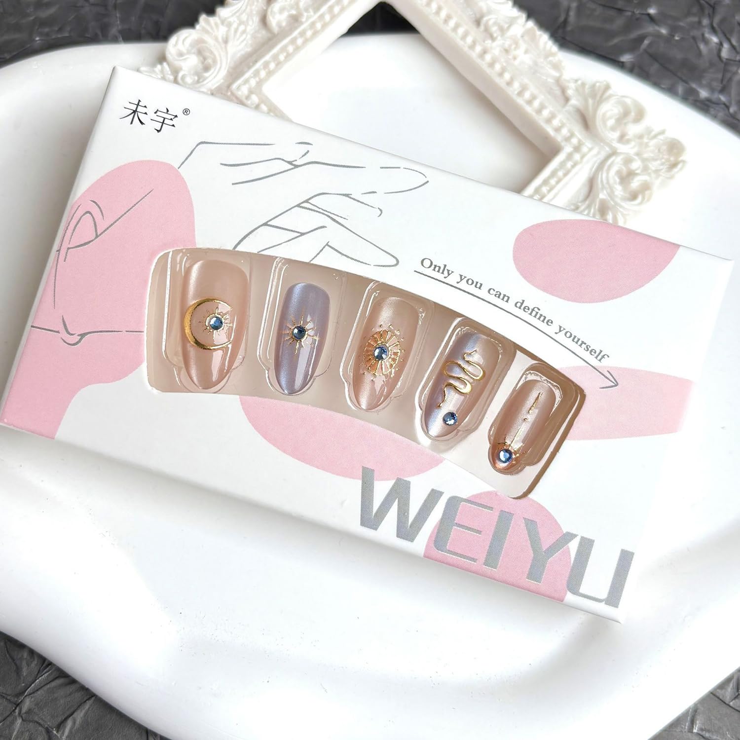 NZRAESTRS lifestyle image of finished nails at a party showing eye-catching style