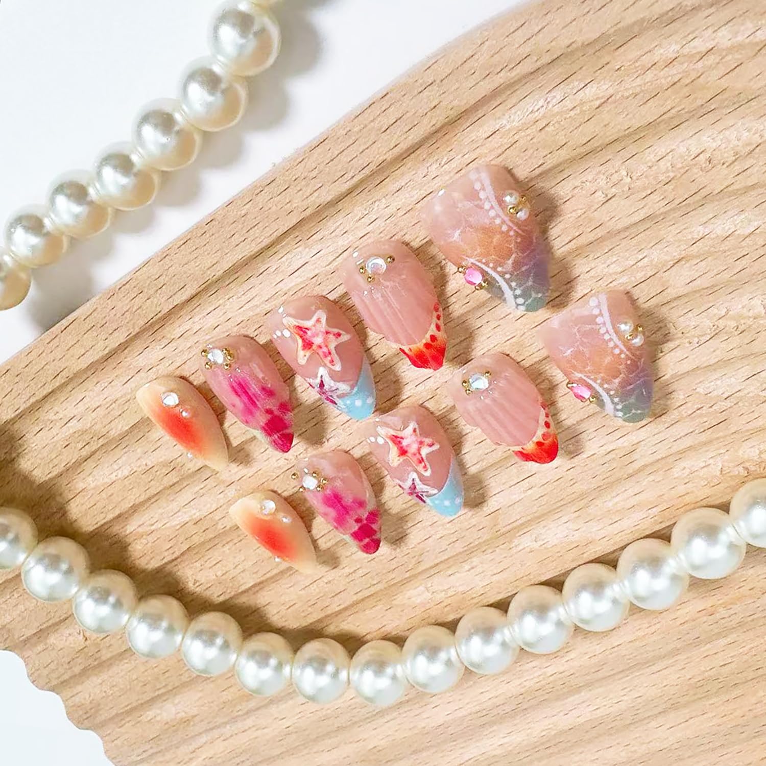 NZRAESTRS rhinestones and starfish accents adding sparkle and seaside charm