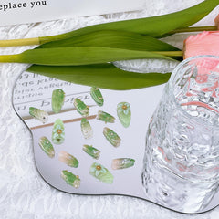 NZRAESTRS detailed view of raised flower and butterfly designs showcasing dimensional artistry
