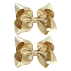 OAOLEER gold bow front view showing glittery satin and pretty shape benefit: photo-ready sparkle