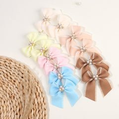 OAOLEER bows matched with school outfit showing versatile styling