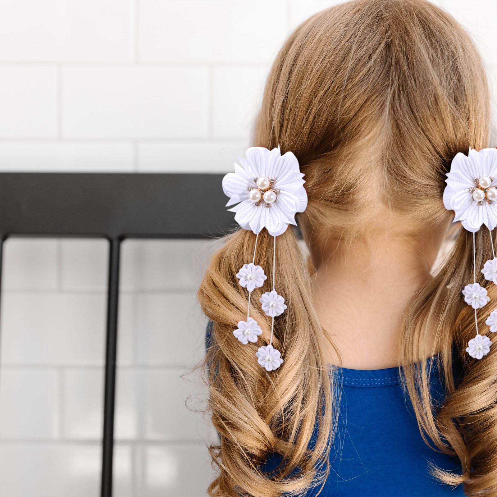 OAOLEER bow clipped in a girl's ponytail demonstrating comfortable hold during wear