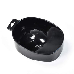 Oarkive bowl beside a hand for size comparison showing compact, space-saving benefit