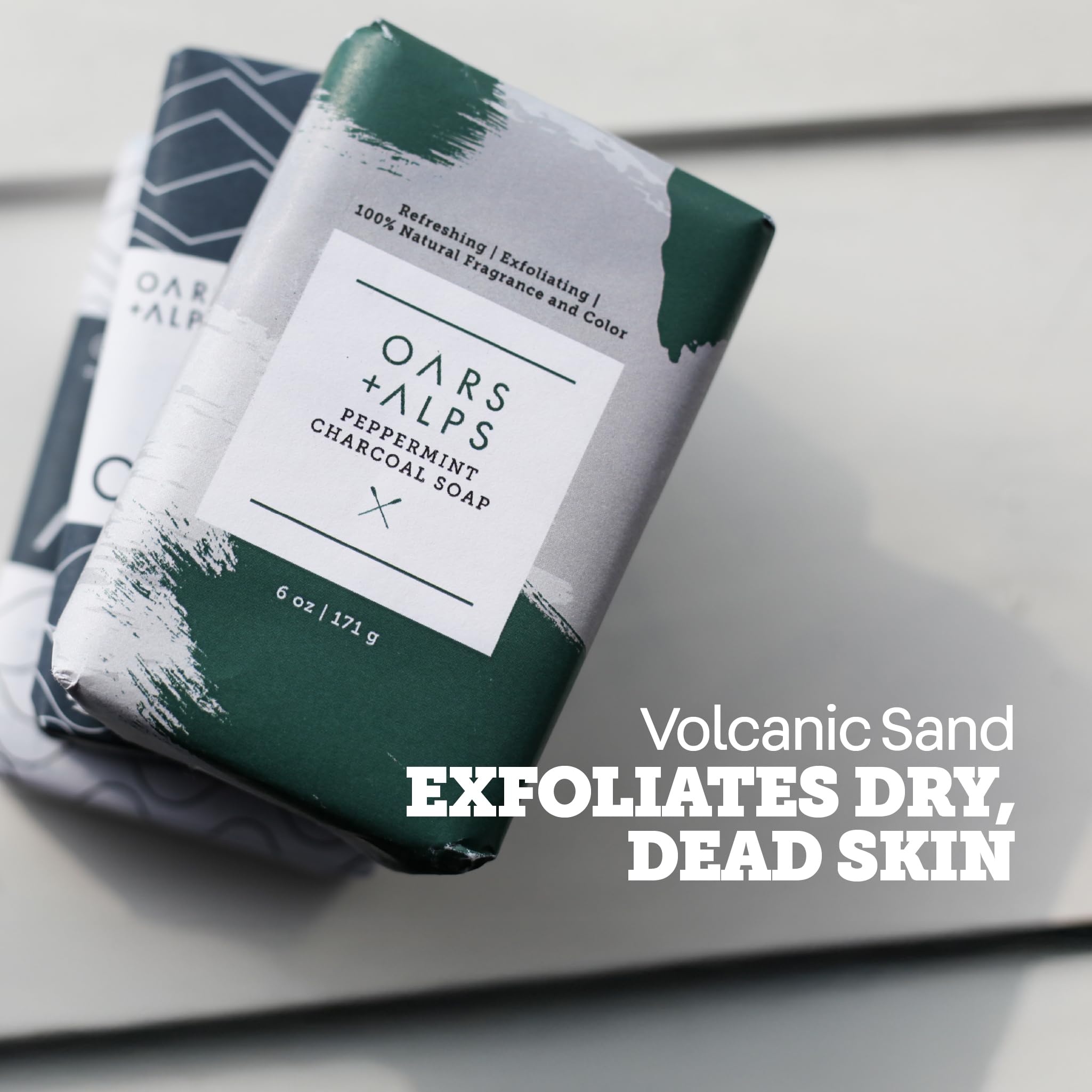 Oars + Alps activated charcoal and spirulina ingredient display for deep clean