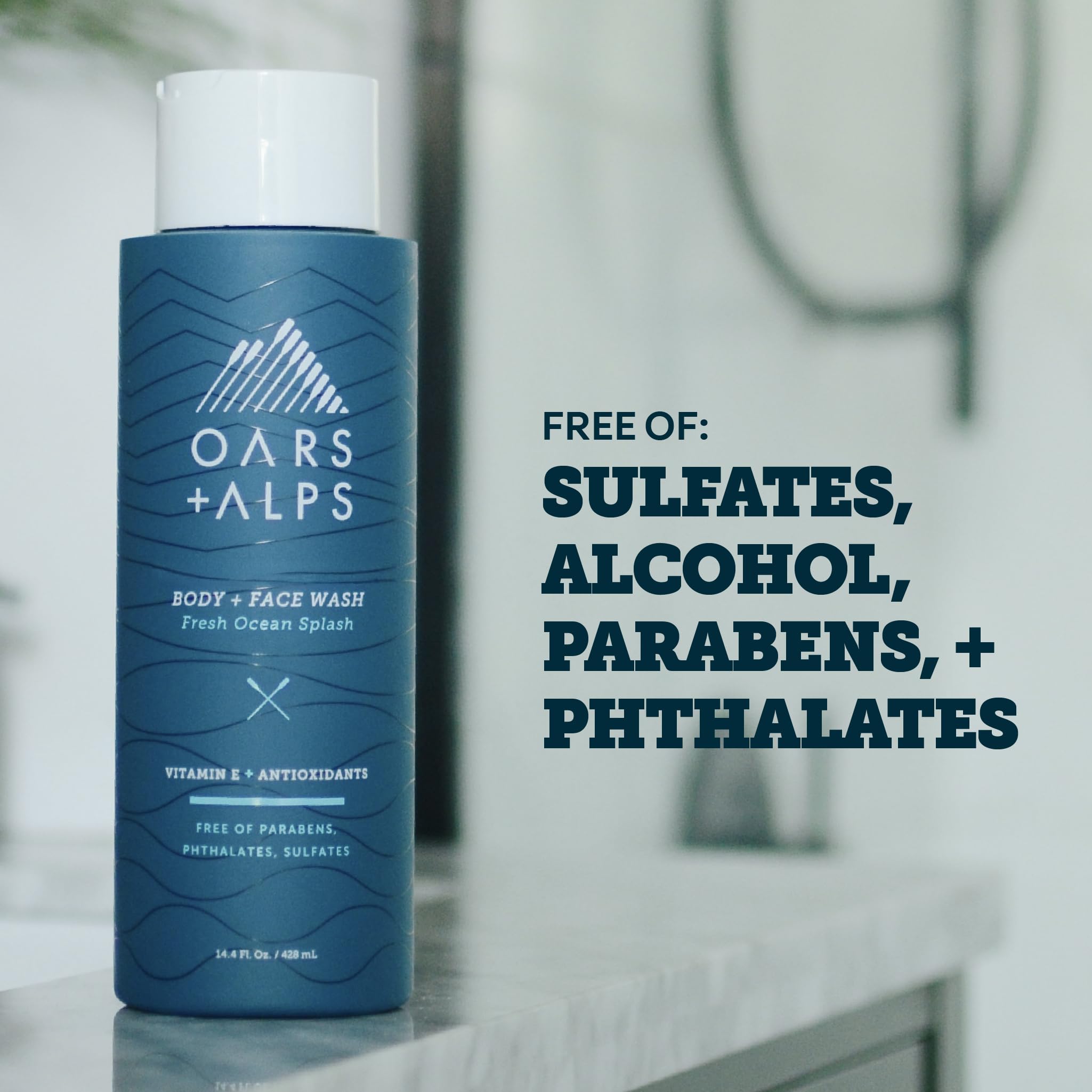 Oars + Alps bottle held in hand to show size and travel convenience