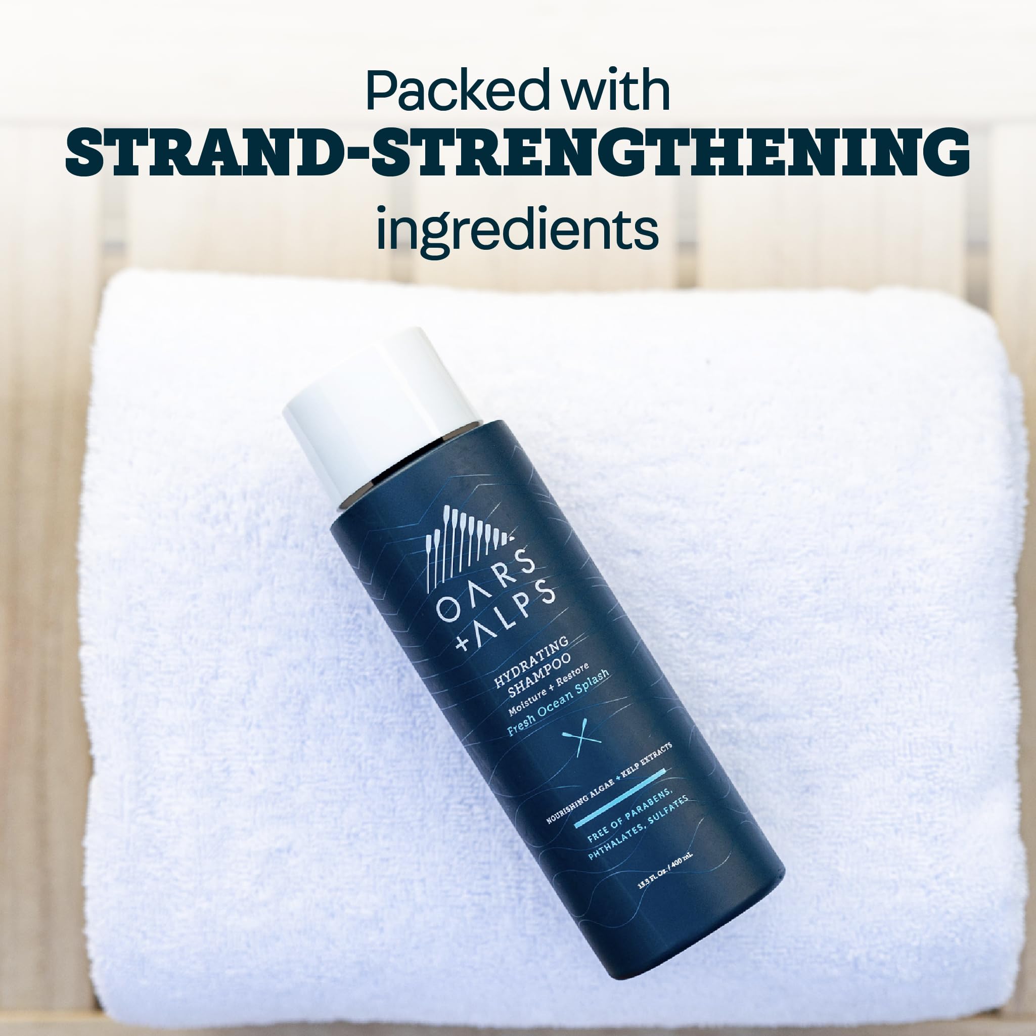 Oars + Alps shampoo in shower use showing cleansing action and fresh scent