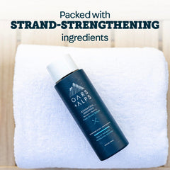 Oars + Alps shampoo in shower use showing cleansing action and fresh scent