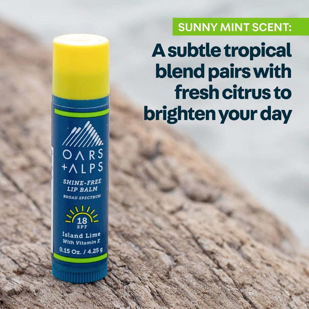 Oars + Alps lip sunscreen next to keys showing pocket-size convenience
