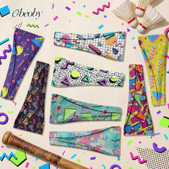 obeoby eight headbands laid flat displaying assorted prints and mix-and-match benefit