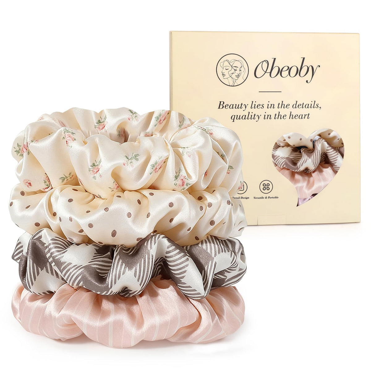 obeoby front packaging showing four patterned silk scrunchies, ready to gift and wear