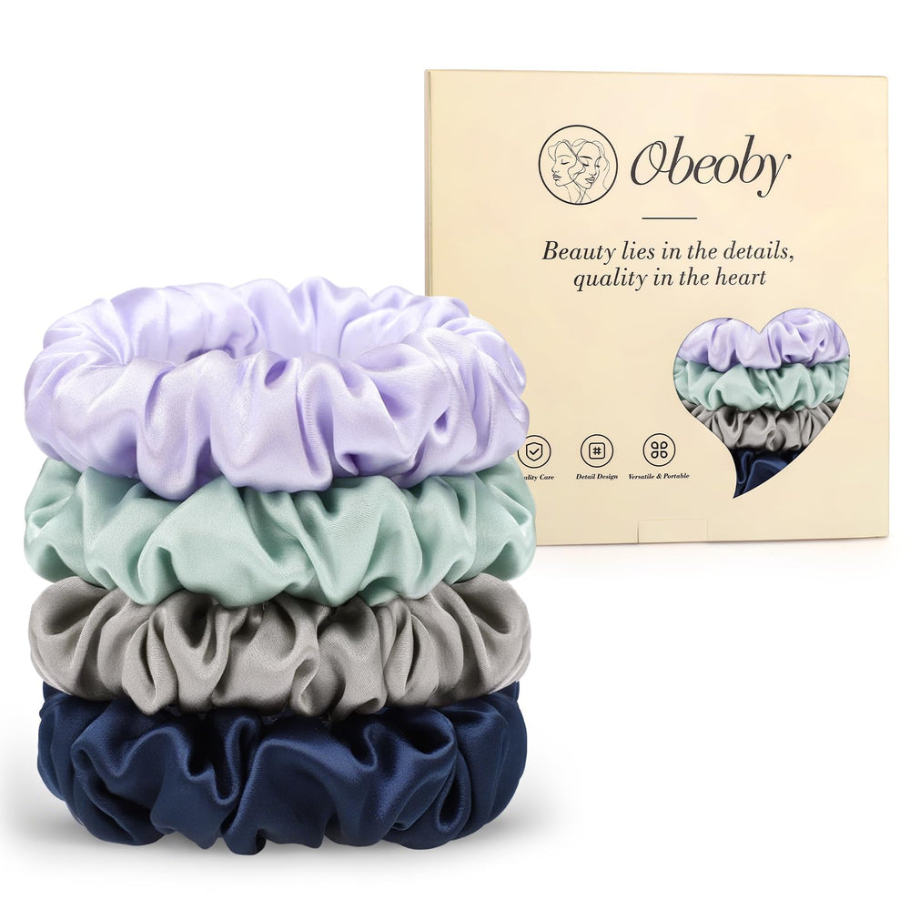 obeoby sage green scrunchie front view shows smooth silk and gentle hold