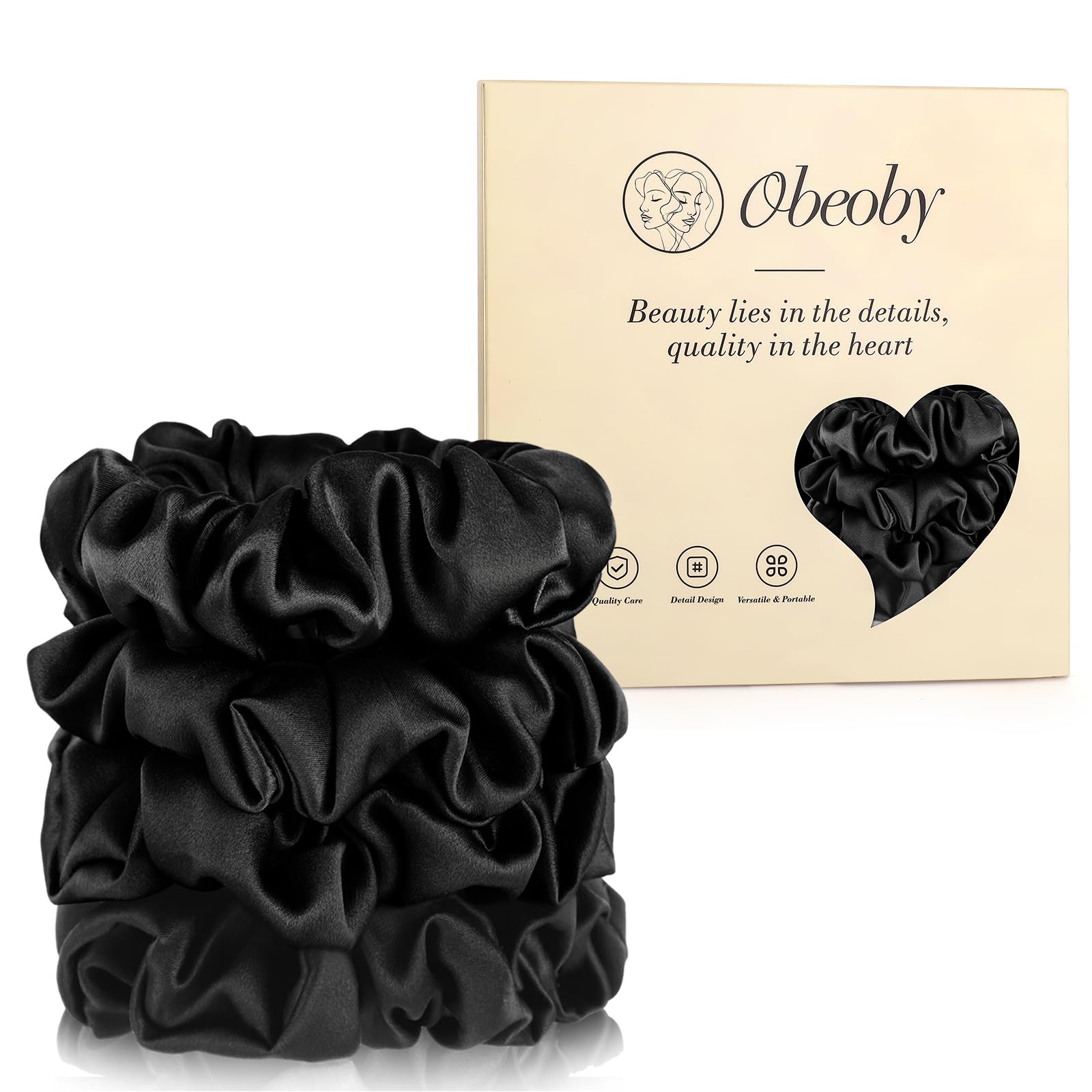obeoby front view of black silk scrunchie shows smooth finish and elegant sheen