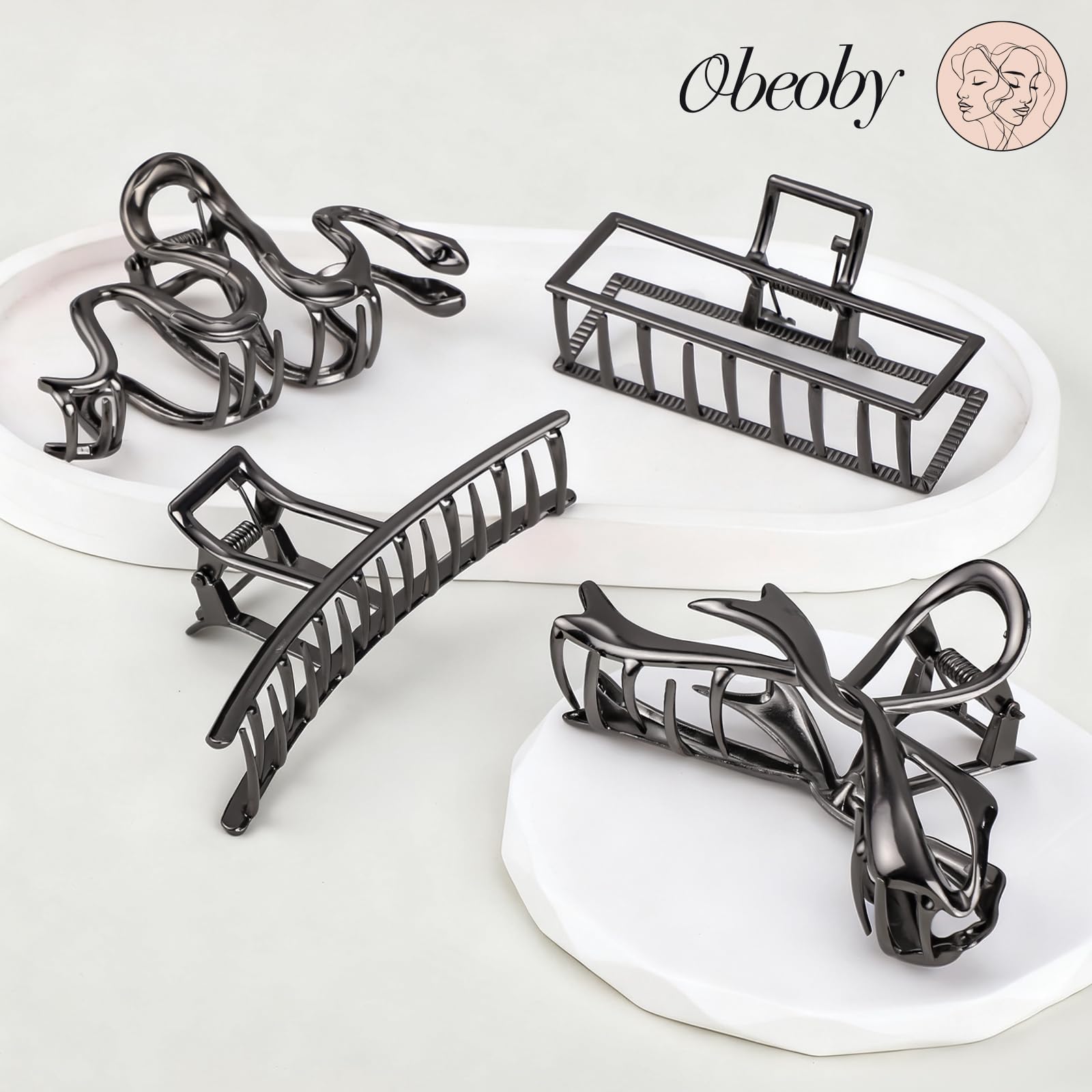 obeoby all four metal claw clips displayed on a vanity table showing variety and ready-to-use convenience
