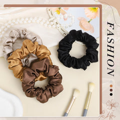obeoby silk scrunchies on nightstand near pillow showing nighttime hair protection