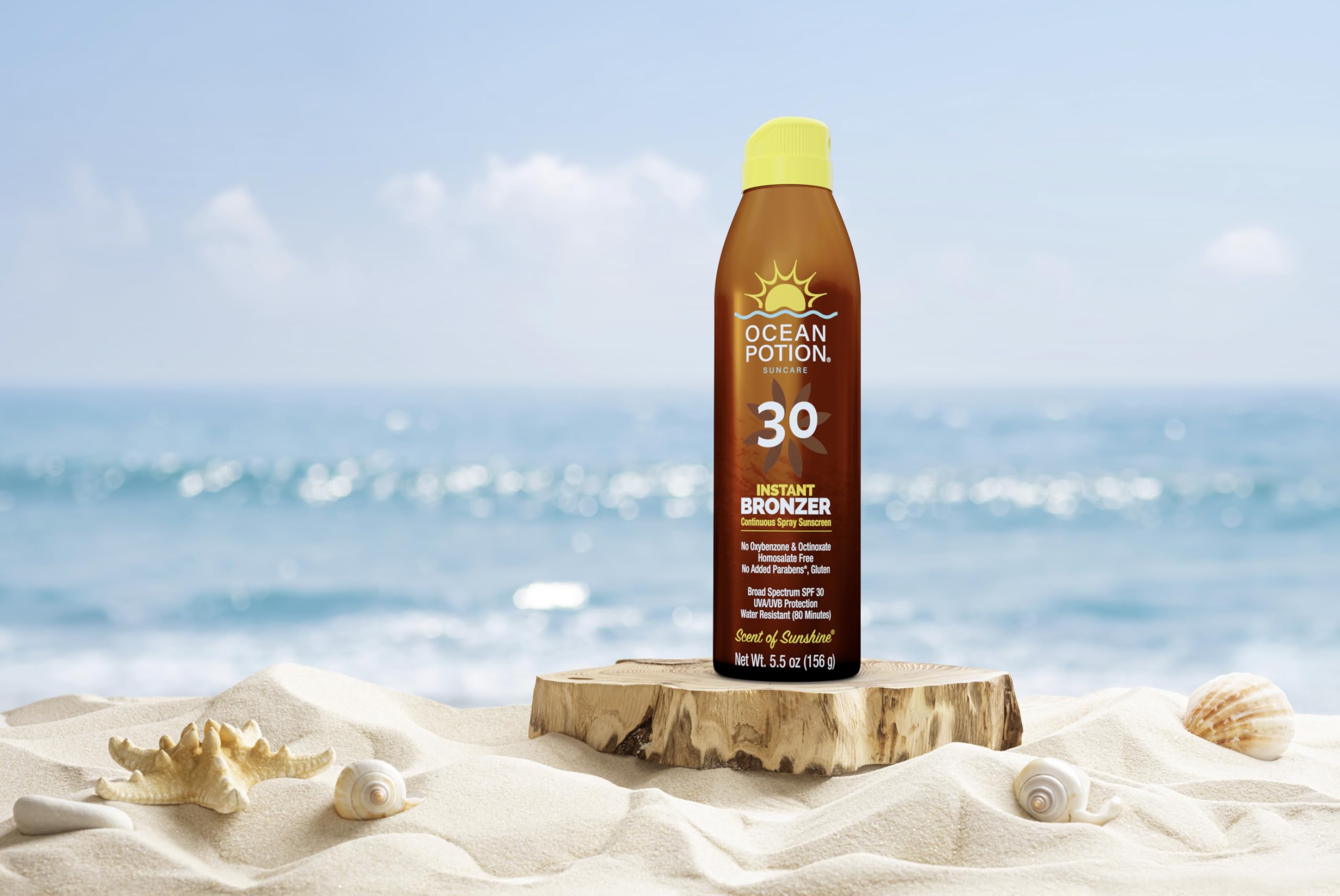 Person applying Ocean Potion on beach for hydrated, protected skin