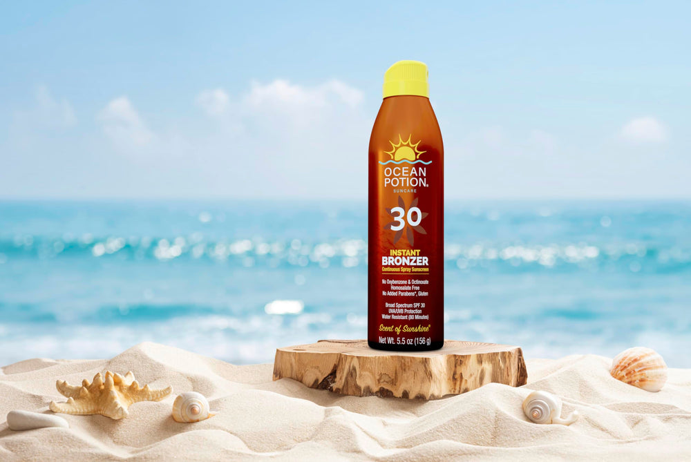 Person applying Ocean Potion on beach for hydrated, protected skin