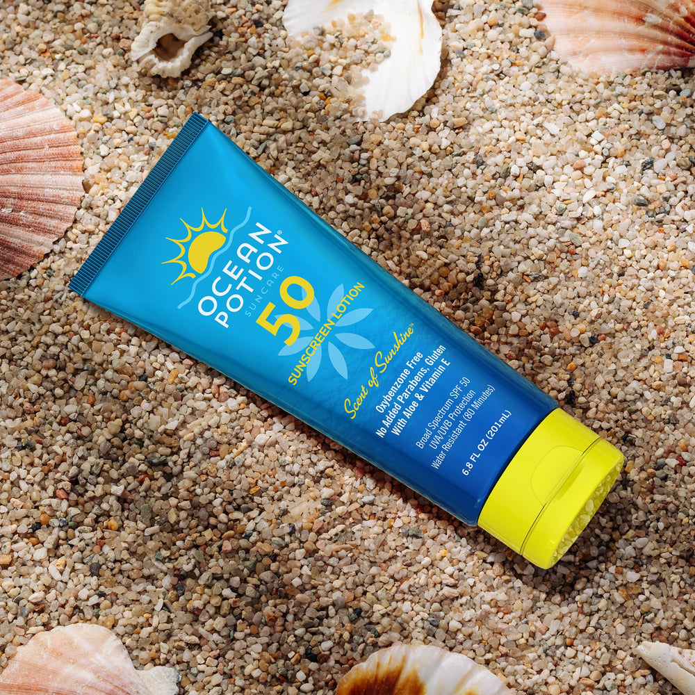 Ocean Potion open cap with lotion droplet showing quick-absorb formula benefit