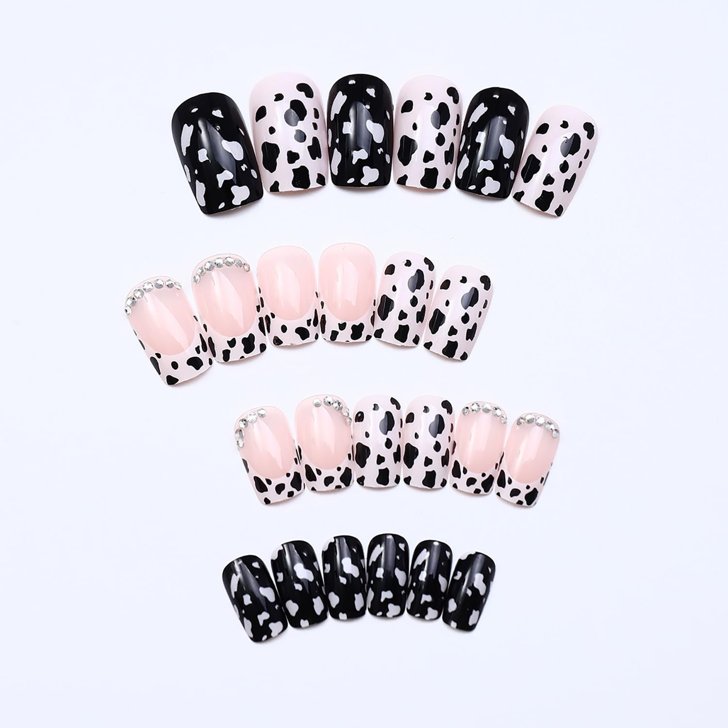 OCOUYVD close-up of cow-print accent nail highlighting bold pattern