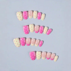 OCOUYVD nails on a finger for scale comparison demonstrating true-to-size fit