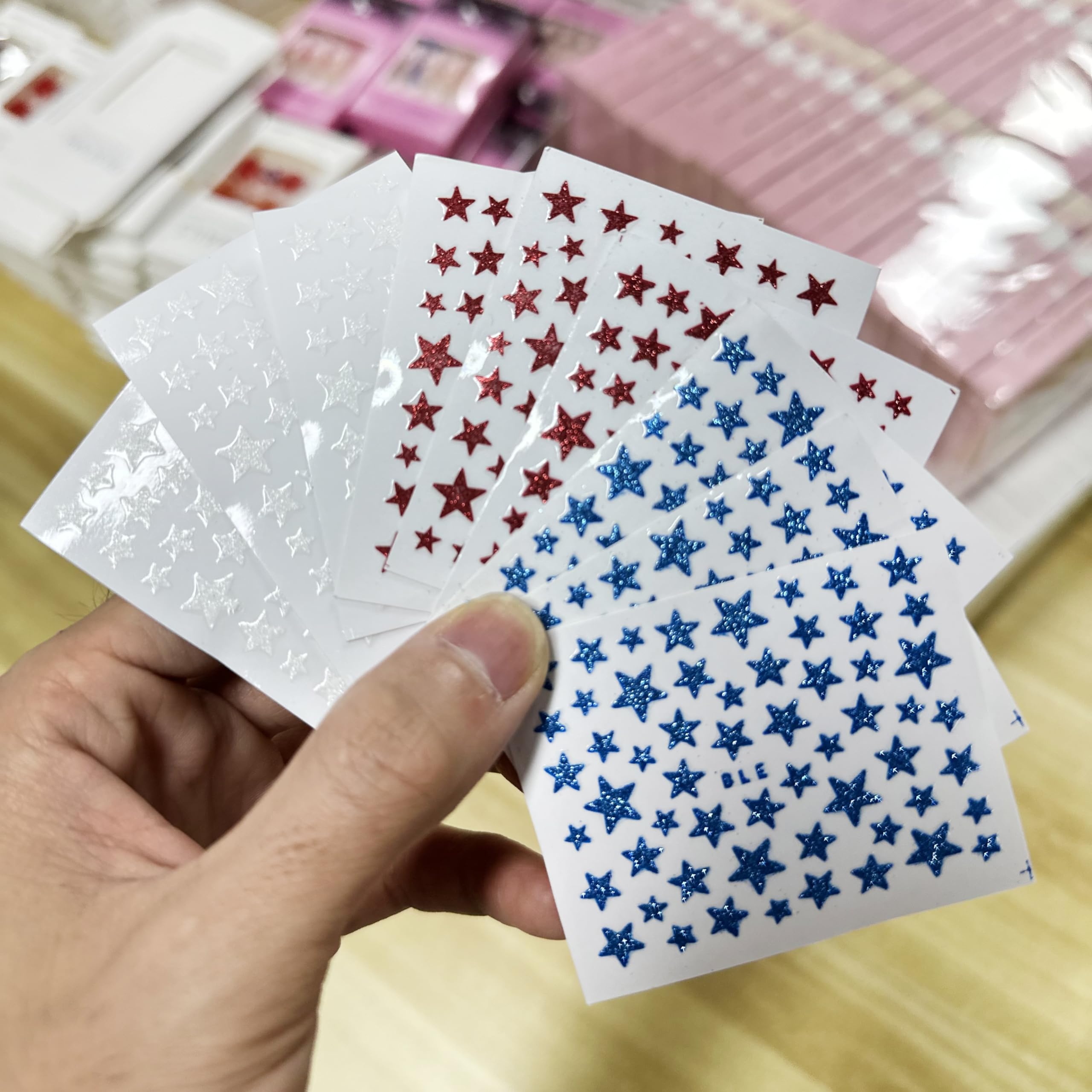 OCOUYVD three sticker sheets fanned to show variety of red blue white patterns