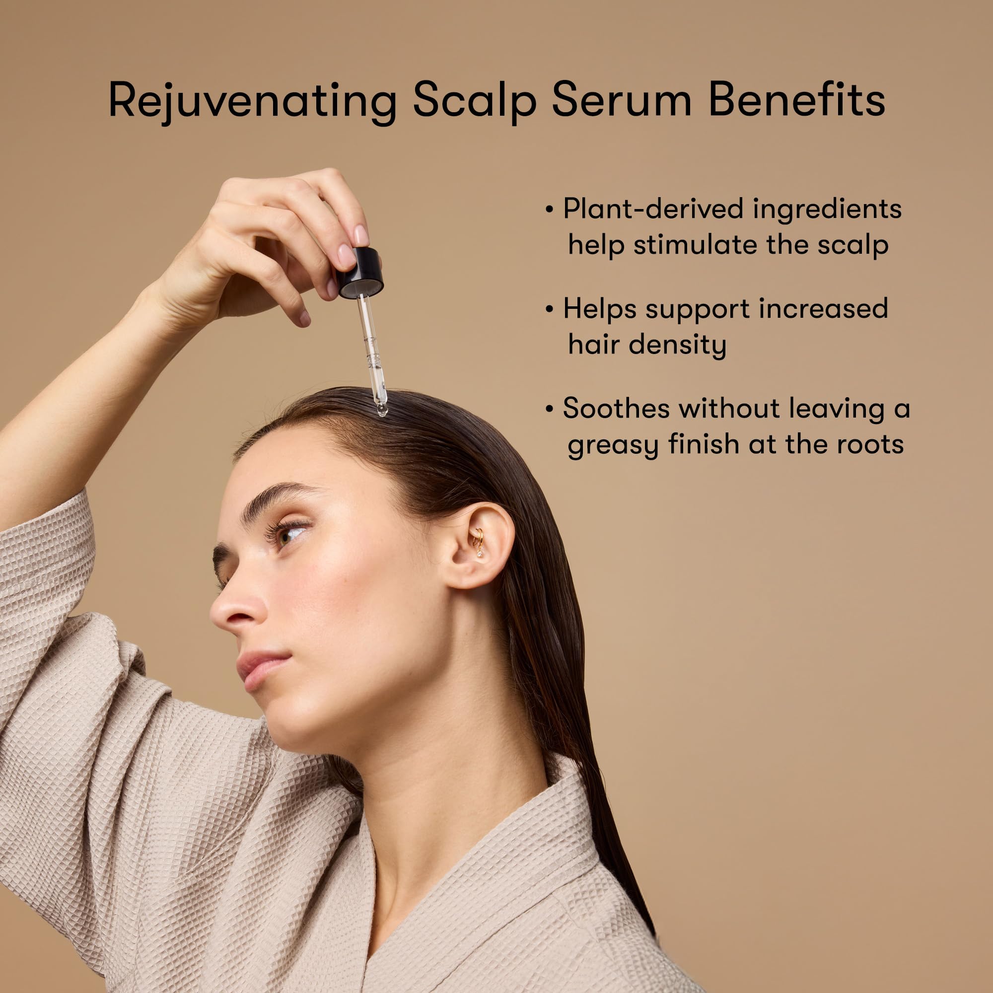 Applying Odele serum to scalp, targeted root treatment for fuller-looking hair