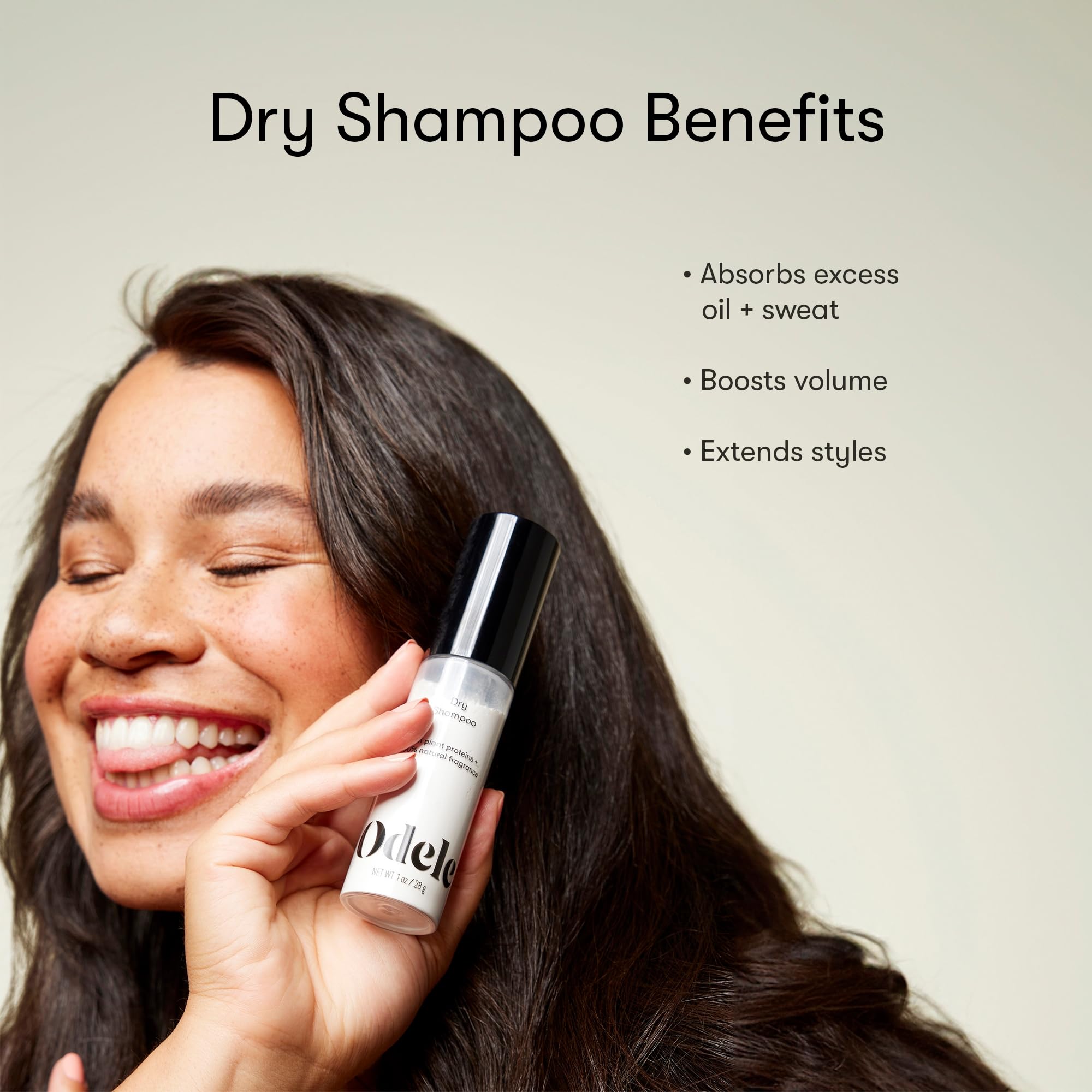 Applying Odele powder to roots with fingertips for instant lift
