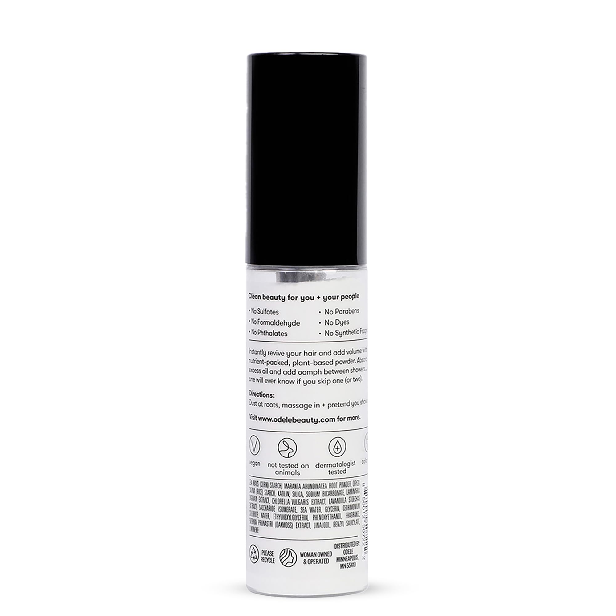 Person refreshing hair midday using Odele for fuller looking hair