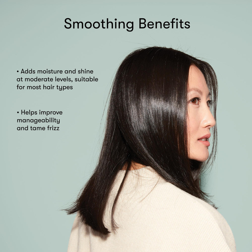 Odele shampoo in hand illustrating bottle scale and pour control