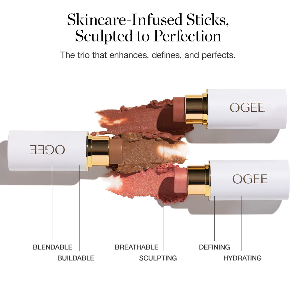 Ogee highlighter stick swatch on arm showing luminous natural sheen