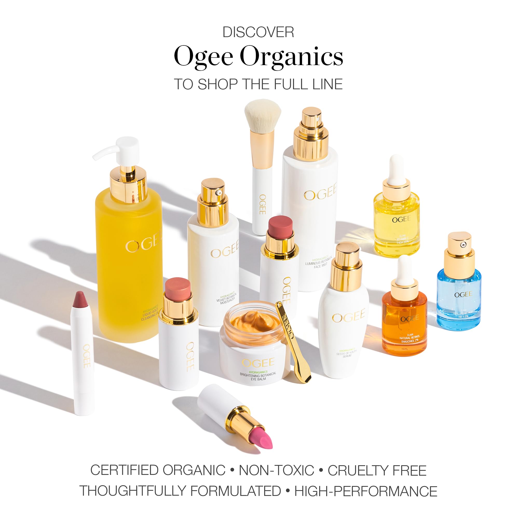 Ogee trio in hand for scale, showing travel-friendly compact size