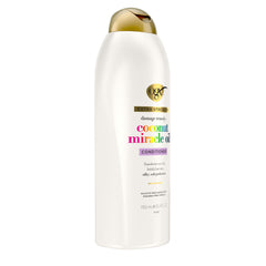 OGX bottle staged on bathroom shelf conveying daily routine convenience