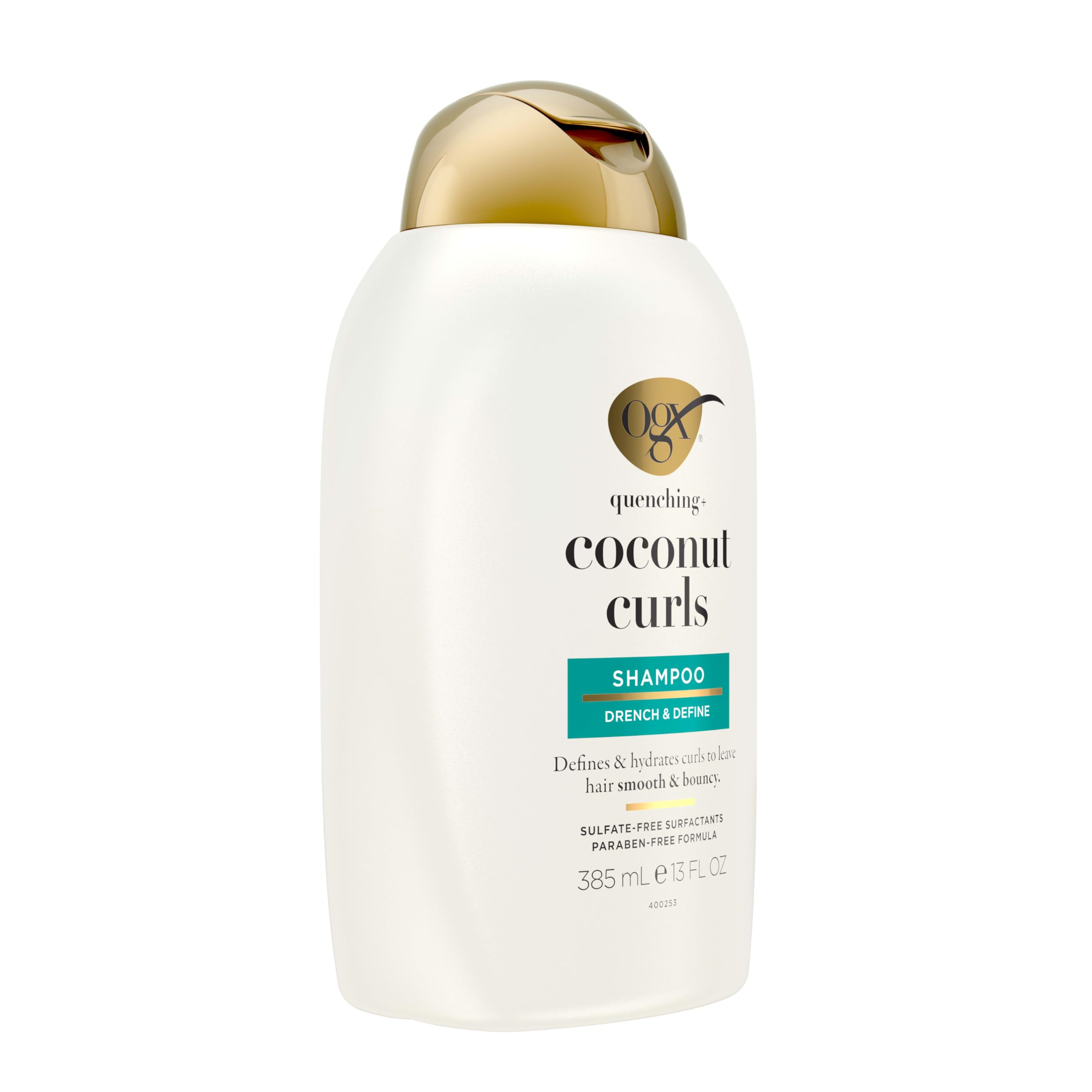OGX bottle with coconut, honey and citrus ingredients illustrating natural nourishment