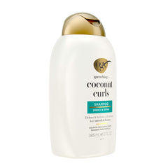 OGX bottle with coconut, honey and citrus ingredients illustrating natural nourishment