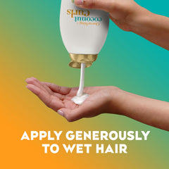 Foamy lather from OGX in hand demonstrating gentle cleansing and slip