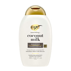 OGX front bottle view showing coconut milk shampoo and easy-grip design