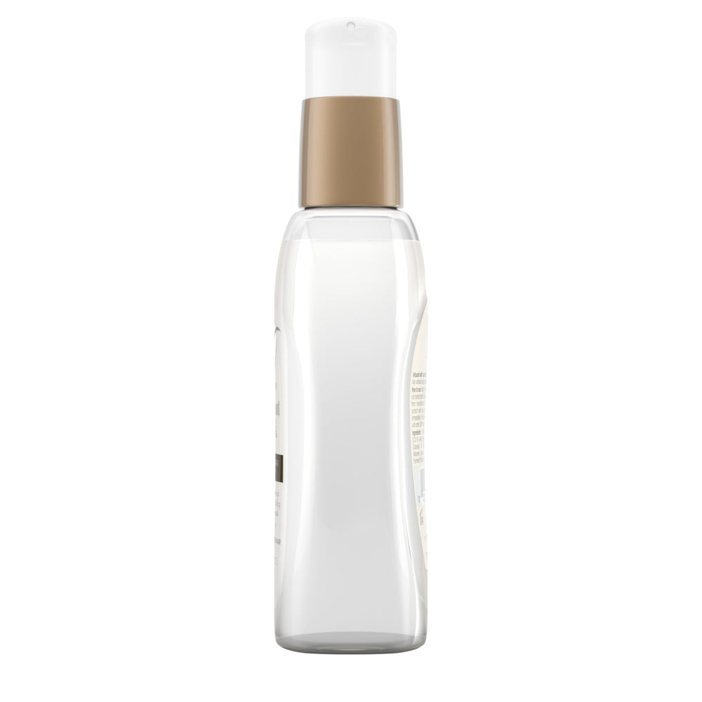 OGX serum on dry styled hair showing added shine and frizz control benefit